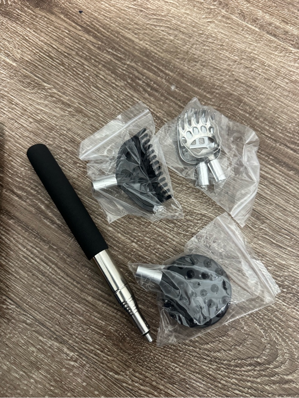Black and Silver Handheld Back Scratcher with Interchangeable Heads